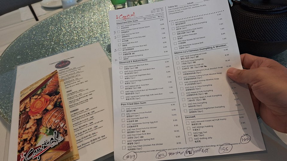 Dim sum restaurant interior with casual table service.