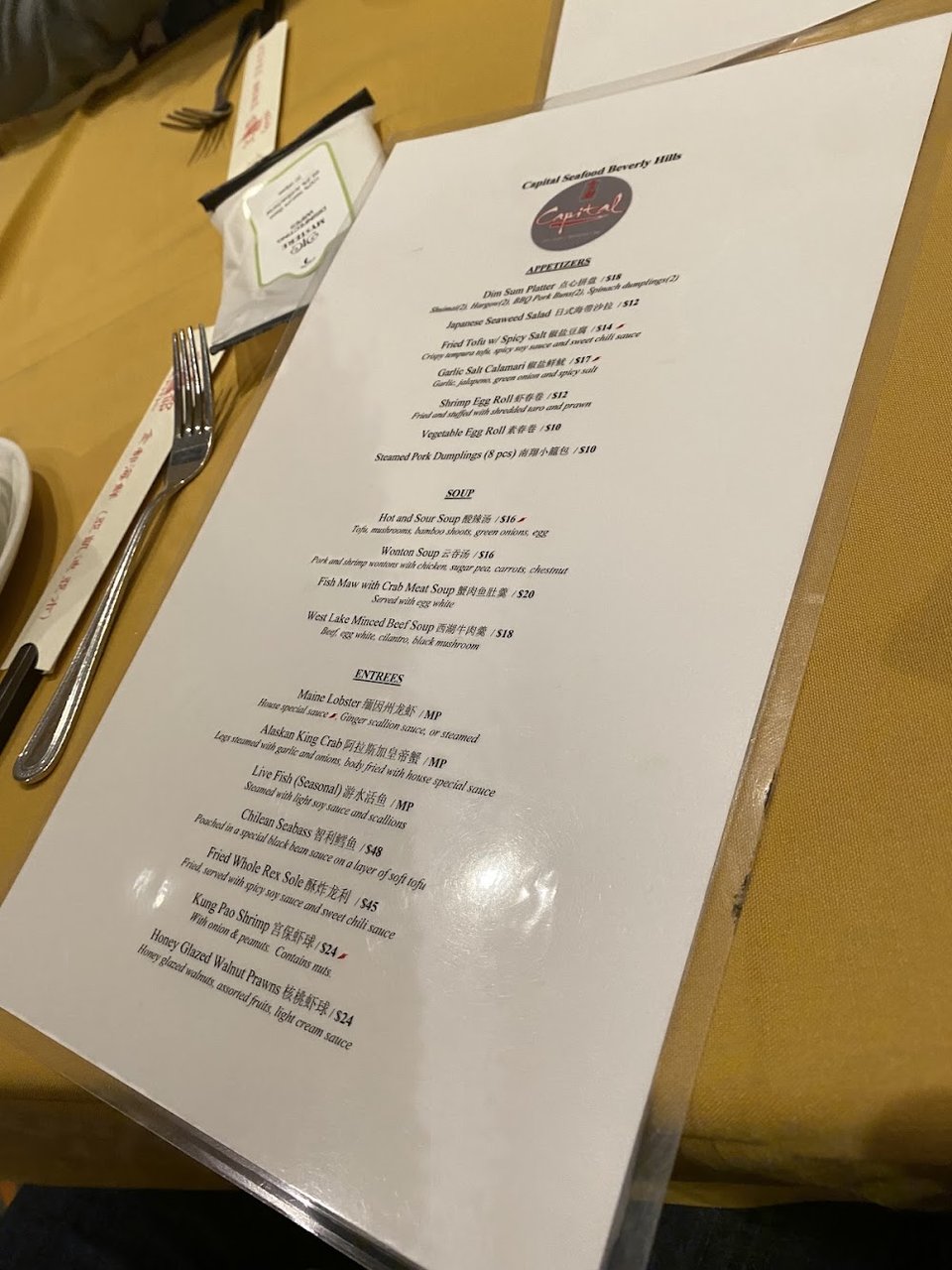 Restaurant menu with dessert, chicken, and pork categories.
